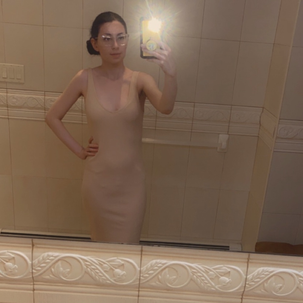 Midi beige colored ribbed sleeveless dress